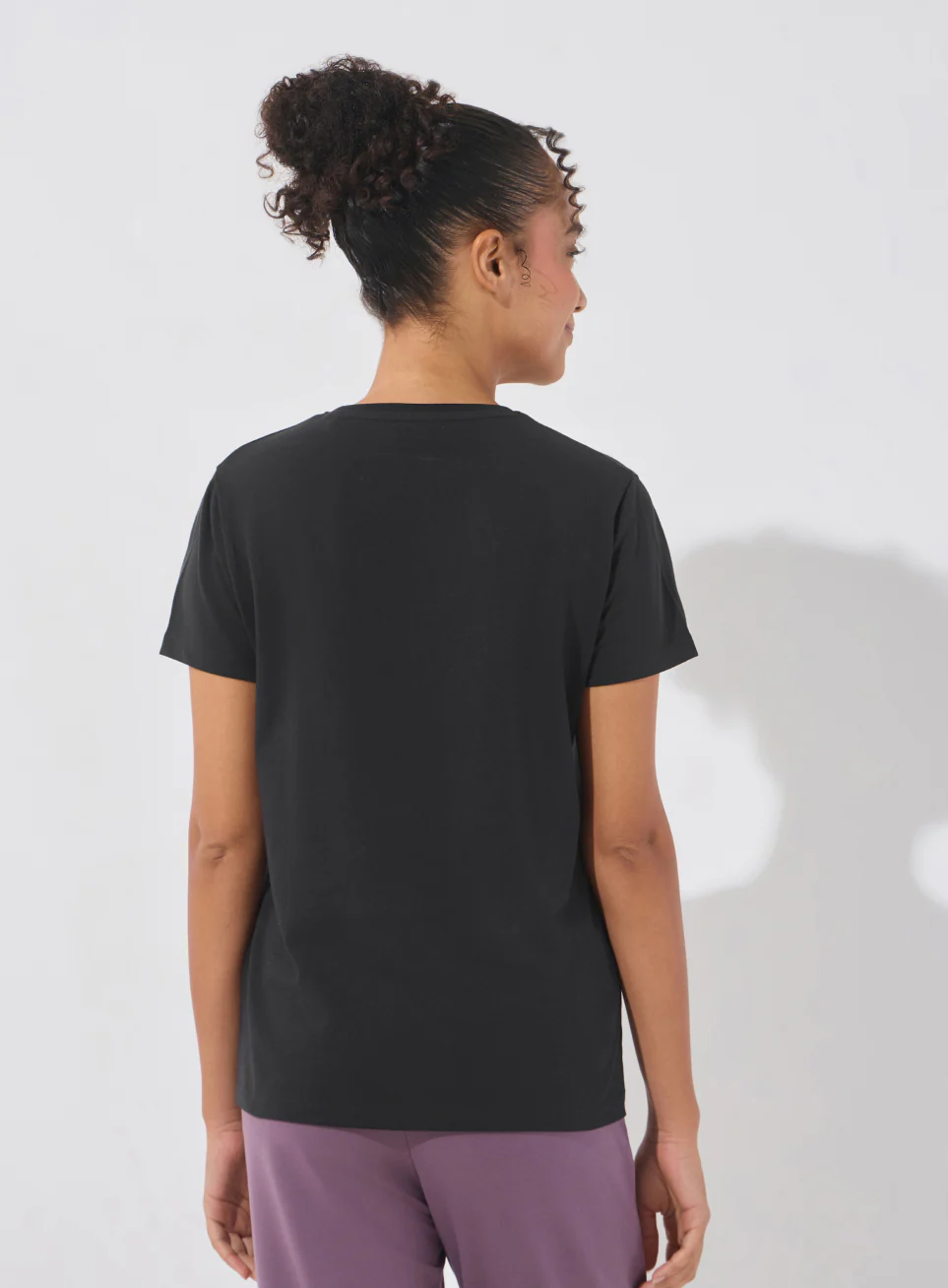 Back view of the black T-shirt